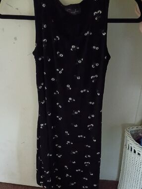 Sleeveless Black Mini Dress with White Daisy Print